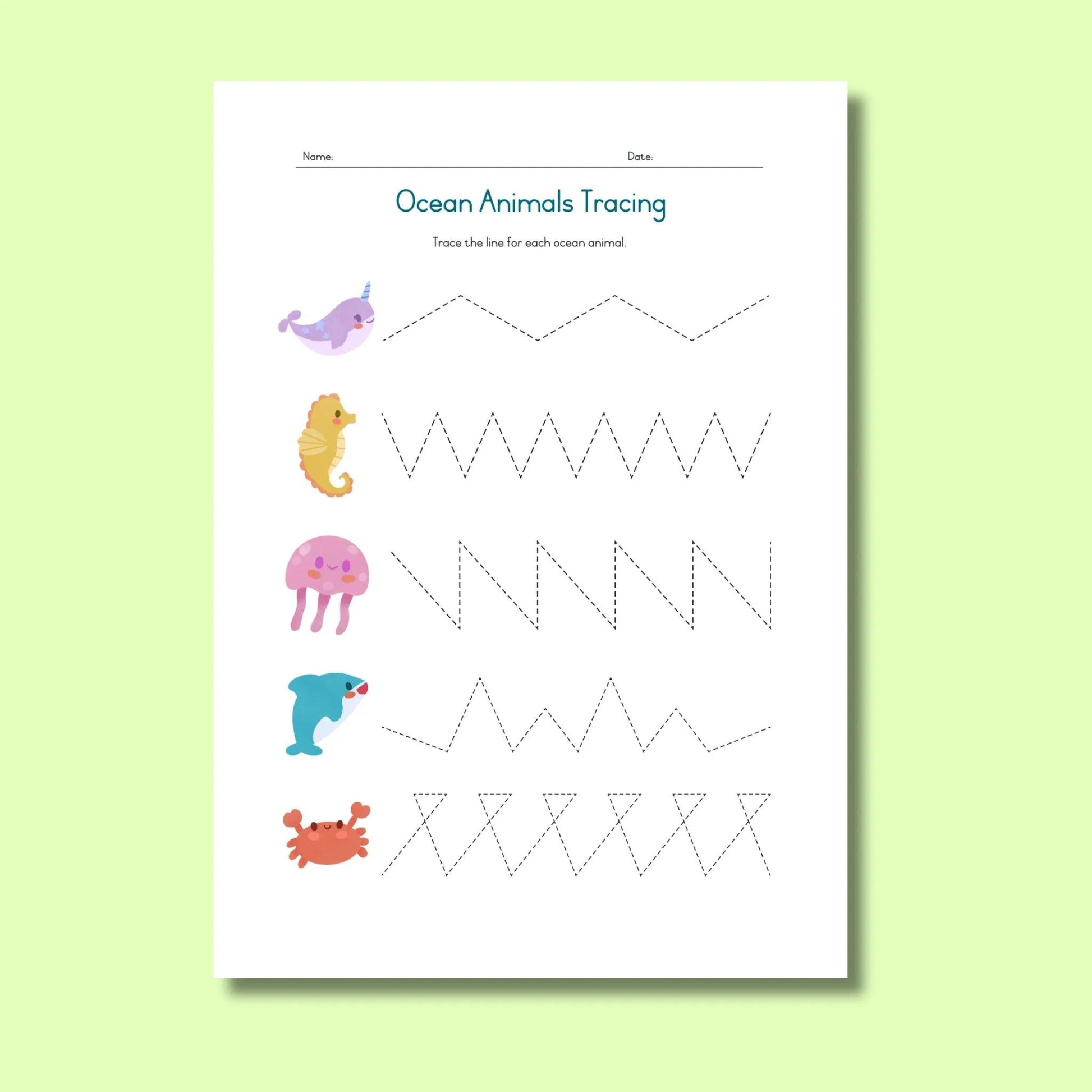 Ocean animals tracing worksheet for kids with narwhal, seahorse, jellyfish, dolphin, and crab illustrations