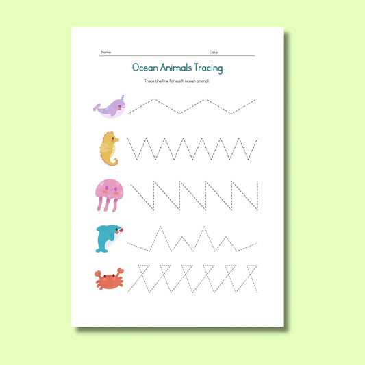 Ocean animals tracing worksheet for kids with narwhal, seahorse, jellyfish, dolphin, and crab illustrations